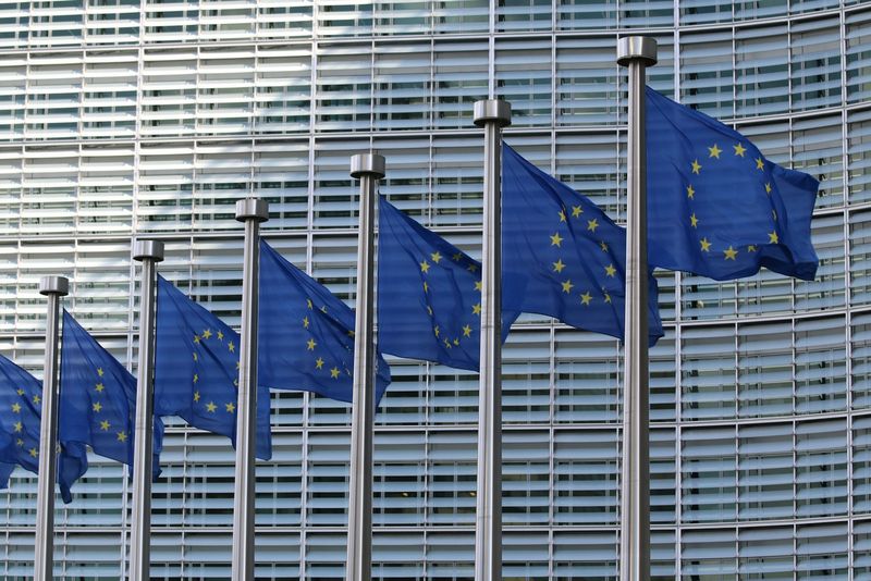 European Union flags in front of the European Commission in Brussels