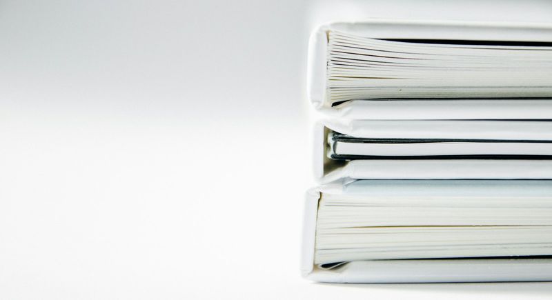 A stack of document folders