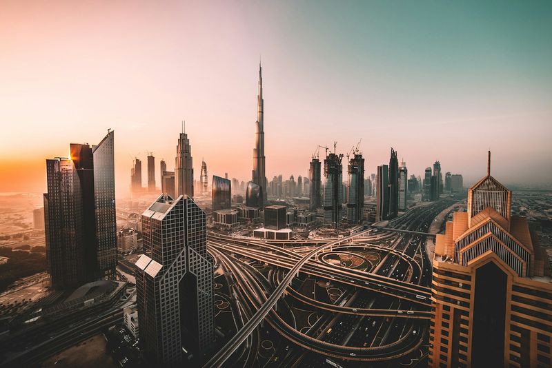 The Burj Khalifa and Downtown Dubai above a highway interchange